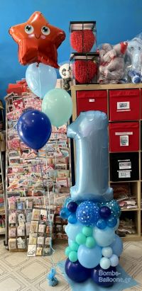 Κατασκευή με το νούμερο ένα σε θαλασσινά χρώματα κι αστερίας